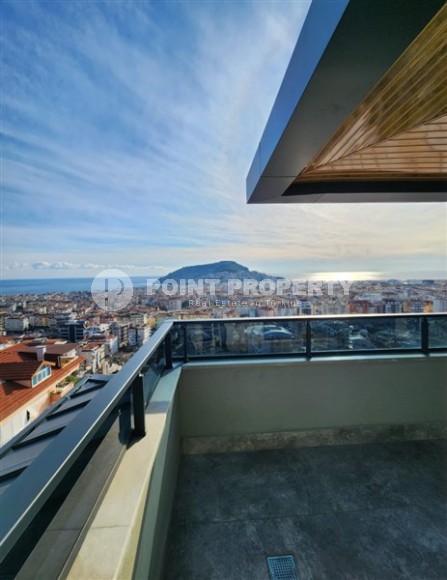 Панорамная квартира с видом на море и гору Кале, на 4-м этаже с мансардой в престижном районе Аланьи - Хасбахче-id-7094-фото-22