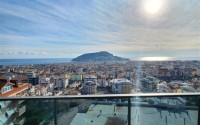 Панорамная квартира с видом на море и гору Кале, на 4-м этаже с мансардой в престижном районе Аланьи - Хасбахче-id-7094-фото-24