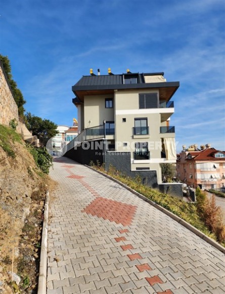 Панорамная квартира с видом на море и гору Кале, на 4-м этаже с мансардой в престижном районе Аланьи - Хасбахче-id-7094-фото-30