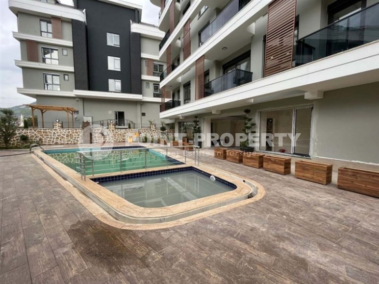 Компактная квартира 1+1, общей площадью 40 м2, в новом жилом комплексе в престижном районе Аланьи - Верхняя Оба-id-7104-фото-7