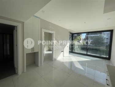 Светлая квартира с качественной чистовой отделкой, в 450 метрах от пляжа Клеопатры, в центре Аланьи-id-7106-фото-3