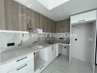 Светлая квартира с качественной чистовой отделкой, в 450 метрах от пляжа Клеопатры, в центре Аланьи-id-7106-фото-5