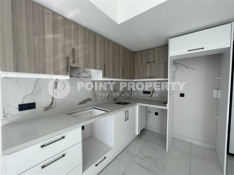 Светлая квартира с качественной чистовой отделкой, в 450 метрах от пляжа Клеопатры, в центре Аланьи-id-7106-фото-5