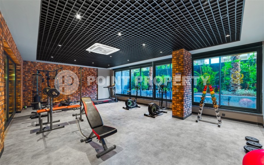 Светлая квартира с качественной чистовой отделкой, в 450 метрах от пляжа Клеопатры, в центре Аланьи-id-7106-фото-11