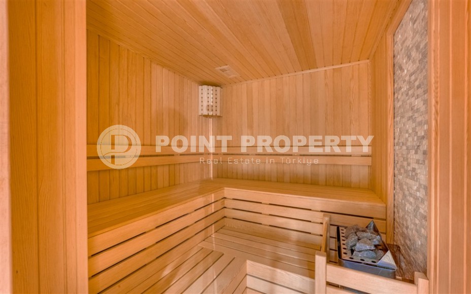 Светлая квартира с качественной чистовой отделкой, в 450 метрах от пляжа Клеопатры, в центре Аланьи-id-7106-фото-12