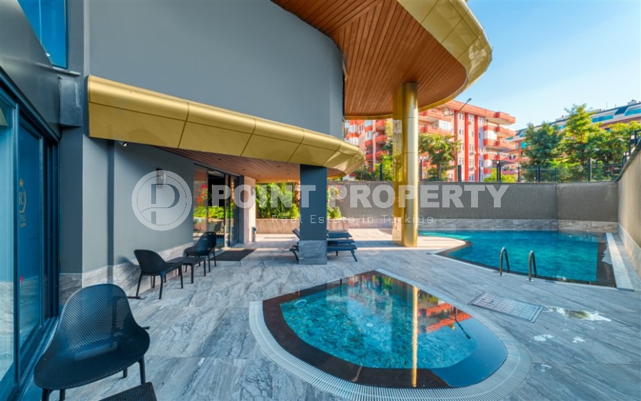 Светлая квартира с качественной чистовой отделкой, в 450 метрах от пляжа Клеопатры, в центре Аланьи-id-7106-фото-17