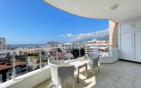 Двухуровневая квартира с панорамным видом на море и горы, на 9-м этаже с мансардой, в центре района Тосмур-id-7110-фото-16