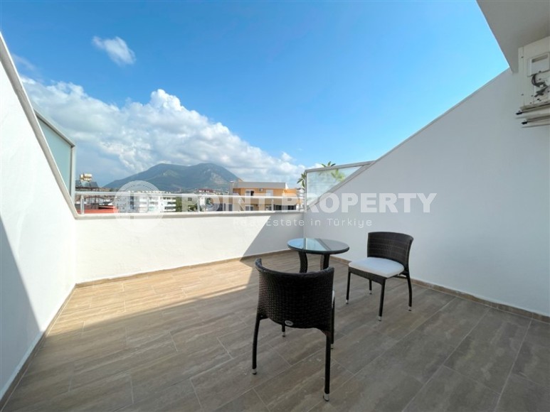 Двухуровневая квартира с панорамным видом на море и горы, на 9-м этаже с мансардой, в центре района Тосмур-id-7110-фото-18