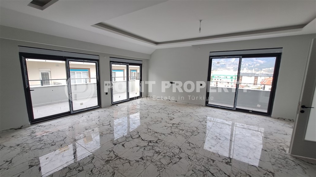 Spacious two-level apartment with panoramic views of the sea and mountains, in a quiet area of Alanya - Upper Oba-id-7114-photo-3