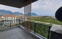 Spacious two-level apartment with panoramic views of the sea and mountains, in a quiet area of Alanya - Upper Oba-id-7114-photo-9