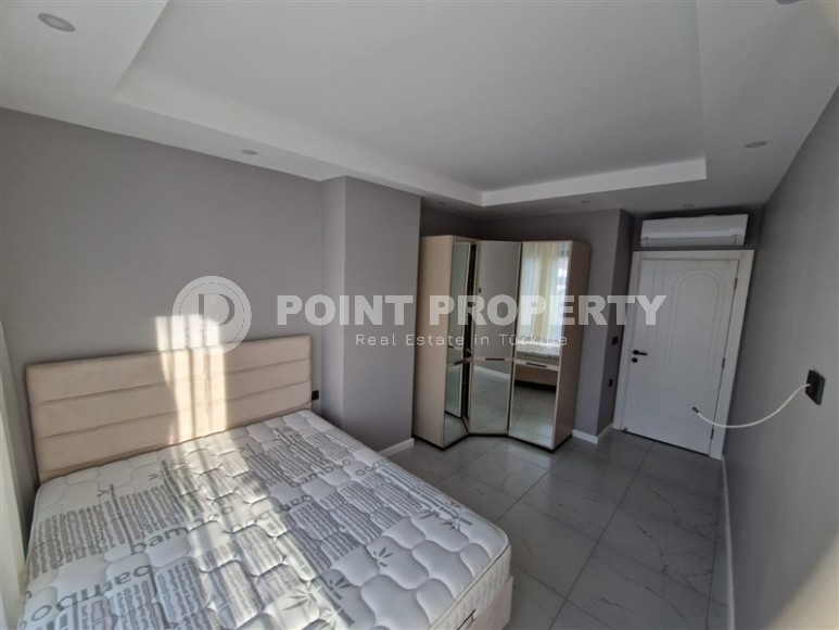 Современная, благоустроенная квартира 1+1, общей площадью 48 м2, в центре спокойного, уютного района Аланьи - Тосмур-id-7119-фото-5