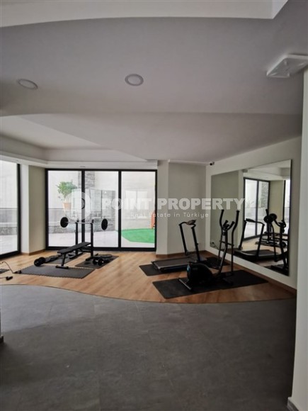 Современная, благоустроенная квартира 1+1, общей площадью 48 м2, в центре спокойного, уютного района Аланьи - Тосмур-id-7119-фото-8