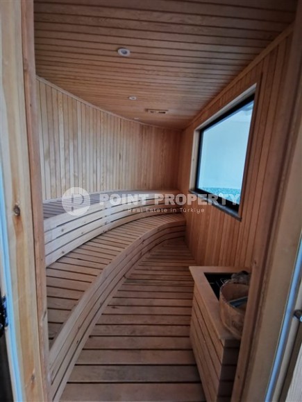 Современная, благоустроенная квартира 1+1, общей площадью 48 м2, в центре спокойного, уютного района Аланьи - Тосмур-id-7119-фото-9