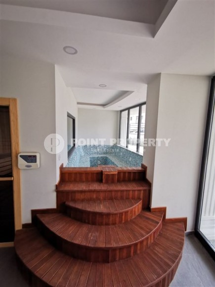 Современная, благоустроенная квартира 1+1, общей площадью 48 м2, в центре спокойного, уютного района Аланьи - Тосмур-id-7119-фото-10