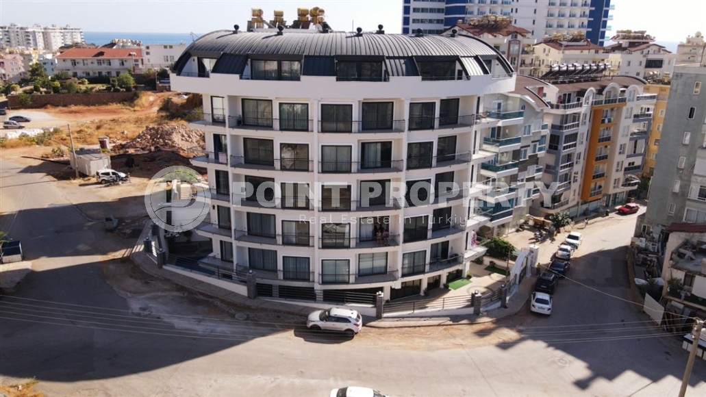 Современная, благоустроенная квартира 1+1, общей площадью 48 м2, в центре спокойного, уютного района Аланьи - Тосмур-id-7119-фото-15