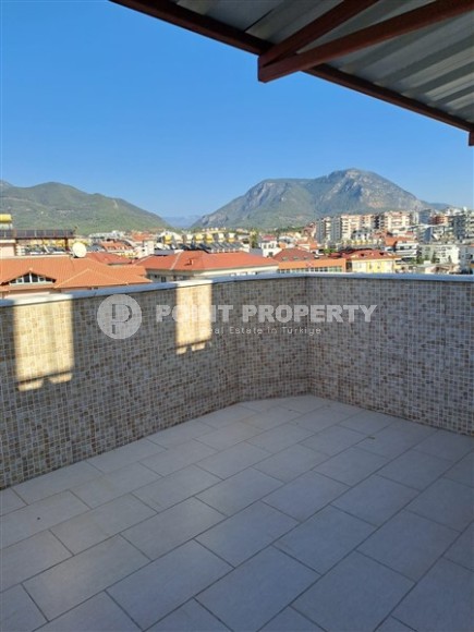 Large two-level apartment 2+1, with a total area of 200 m2, on the 5th floor with an attic, in the center of Oba district-id-7120-photo-13