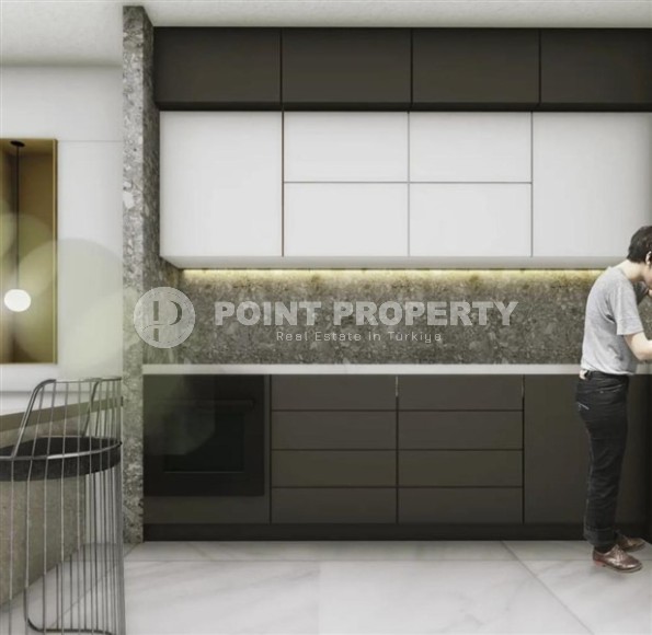 Compact 1+1 apartment in a residential complex under construction, in a promising area of Alanya - Avsallar-id-7121-photo-2