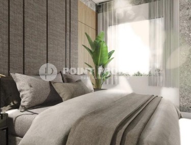 Compact 1+1 apartment in a residential complex under construction, in a promising area of Alanya - Avsallar-id-7121-photo-3