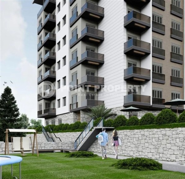 Compact 1+1 apartment in a residential complex under construction, in a promising area of Alanya - Avsallar-id-7121-photo-6