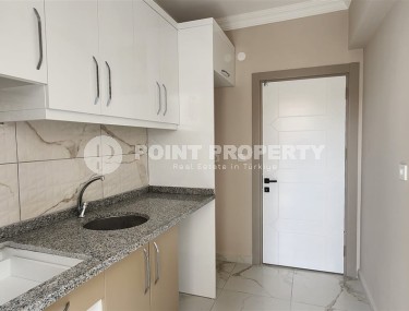 Доступная по цене квартира в 800 метрах от пляжа и набережной, в центре популярного Средиземноморского курорта - Аланья-id-7126-фото-4