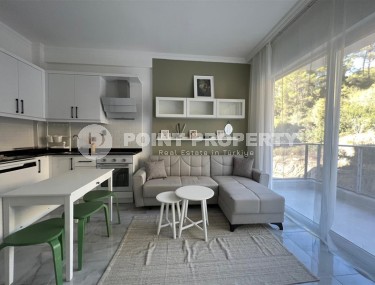 Inexpensive apartment with modern design 1200 meters from the sea, in a calm, picturesque area of Alanya - Avsallar-id-7128-photo-2