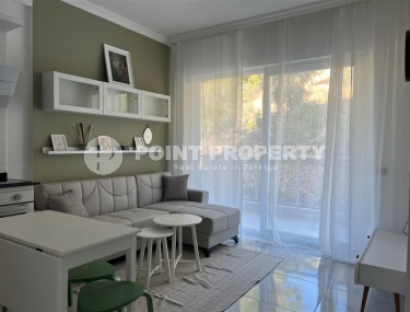 Inexpensive apartment with modern design 1200 meters from the sea, in a calm, picturesque area of Alanya - Avsallar-id-7128-photo-3