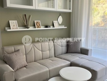 Inexpensive apartment with modern design 1200 meters from the sea, in a calm, picturesque area of Alanya - Avsallar-id-7128-photo-4