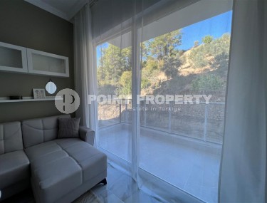 Inexpensive apartment with modern design 1200 meters from the sea, in a calm, picturesque area of Alanya - Avsallar-id-7128-photo-5