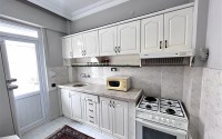 Bright, spacious 1+1 apartment, with a total area of 80 m2, on the 2nd floor in a building built in 2002, in the center of Alanya-id-7135-photo-3