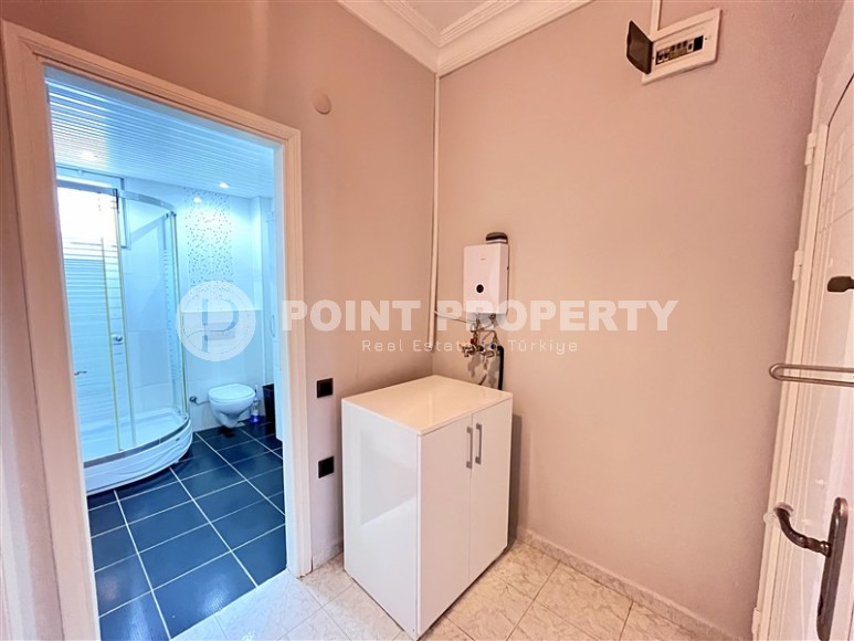 Bright, spacious 1+1 apartment, with a total area of 80 m2, on the 2nd floor in a building built in 2002, in the center of Alanya-id-7135-photo-8