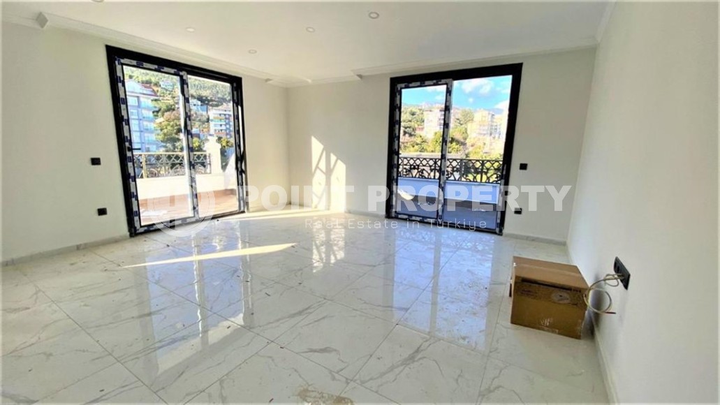 Двухуровневая квартира 2+1 с панорамным видом на Торосские горы, на 4-м этаже с мансардой в новой резиденции, введенной в эксплуатацию в 2023 году-id-7140-фото-3