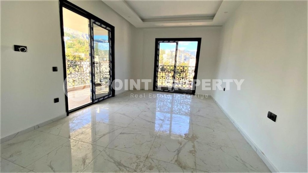 Двухуровневая квартира 2+1 с панорамным видом на Торосские горы, на 4-м этаже с мансардой в новой резиденции, введенной в эксплуатацию в 2023 году-id-7140-фото-4