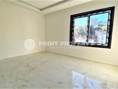 Двухуровневая квартира 2+1 с панорамным видом на Торосские горы, на 4-м этаже с мансардой в новой резиденции, введенной в эксплуатацию в 2023 году-id-7140-фото-5