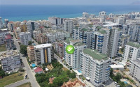 View apartment 1+1, 56m² in an elite complex, 400m from the sea in Mahmutlar, Alanya-id-1557-photo-1
