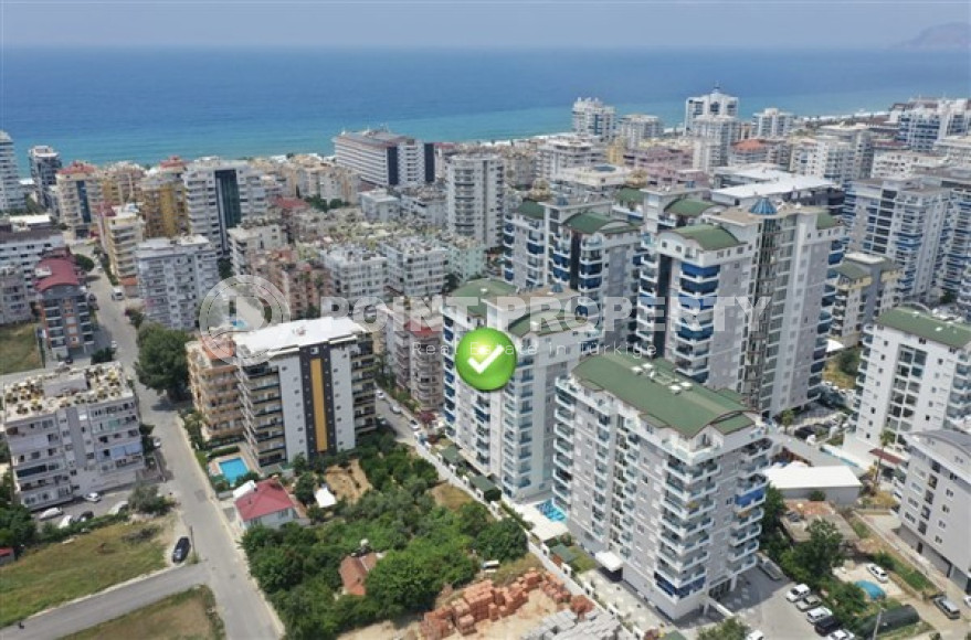 View apartment 1+1, 56m² in an elite complex, 400m from the sea in Mahmutlar, Alanya-id-1557-photo-1