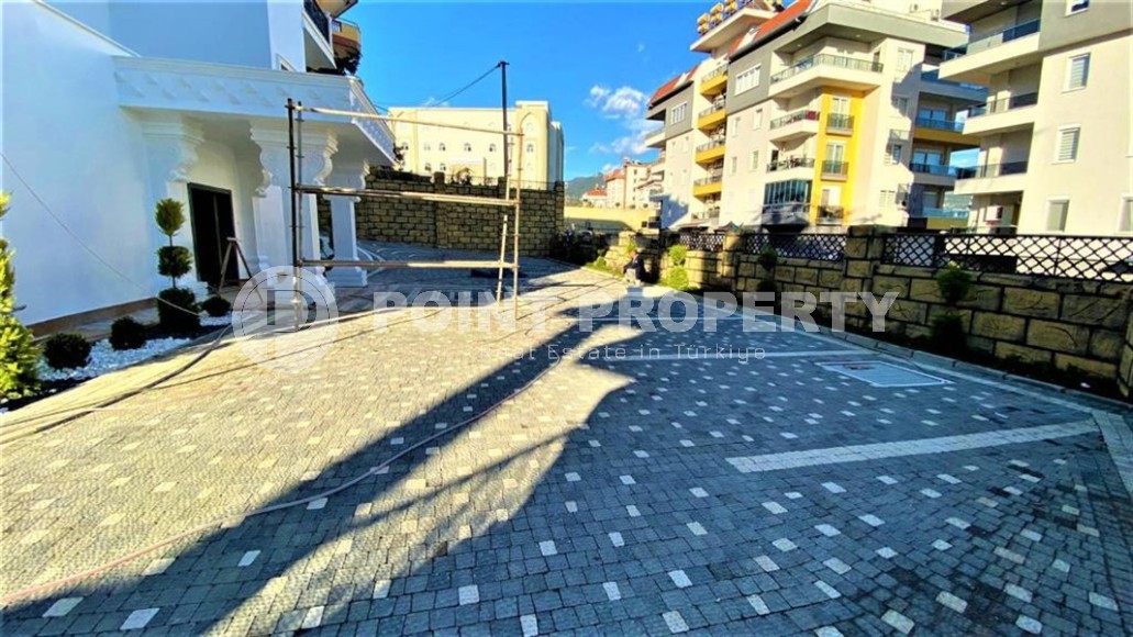 Двухуровневая квартира 2+1 с панорамным видом на Торосские горы, на 4-м этаже с мансардой в новой резиденции, введенной в эксплуатацию в 2023 году-id-7140-фото-17