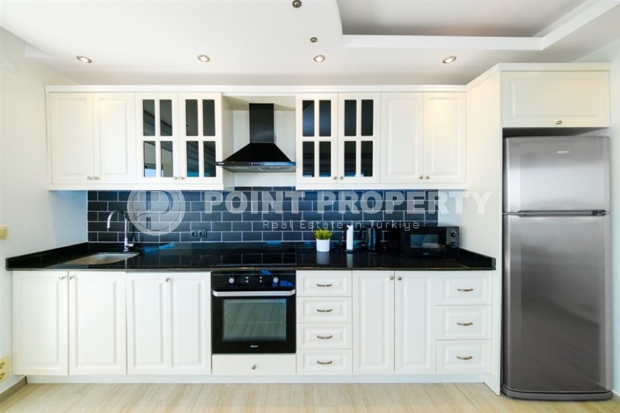 Atmospheric 2+1 apartment with a large glazed balcony, 900 meters from the sea, in a quiet area of Alanya - Avsallar-id-7143-photo-4