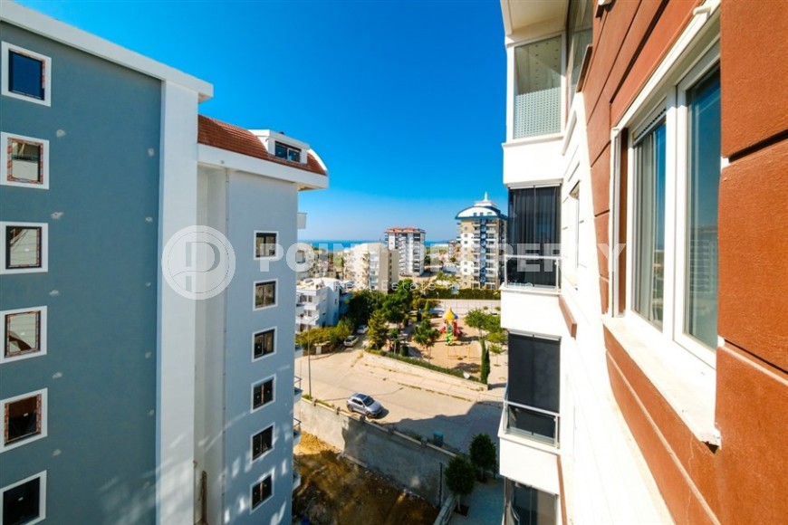 Atmospheric 2+1 apartment with a large glazed balcony, 900 meters from the sea, in a quiet area of Alanya - Avsallar-id-7143-photo-16
