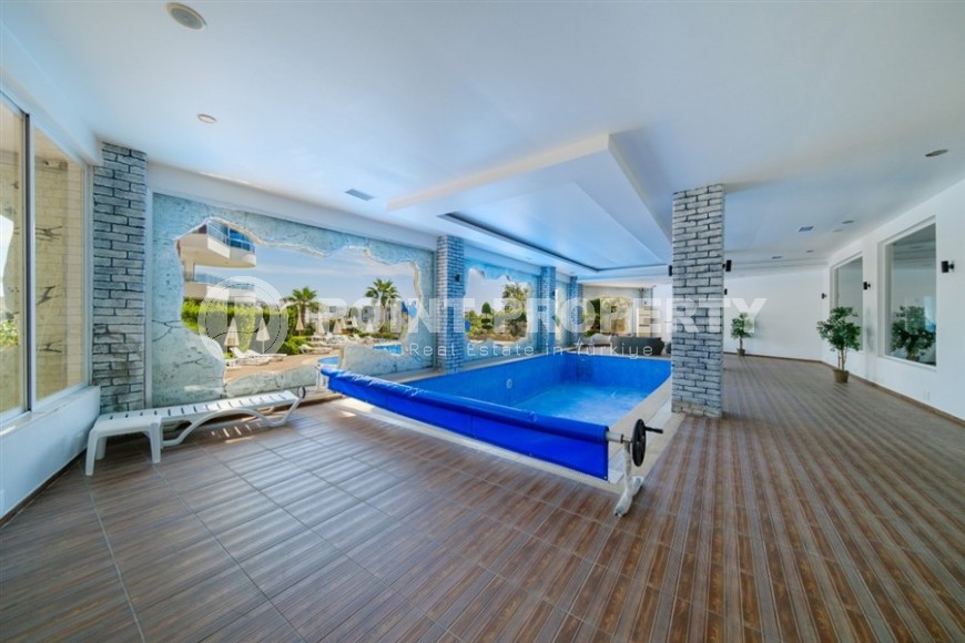 Atmospheric 2+1 apartment with a large glazed balcony, 900 meters from the sea, in a quiet area of Alanya - Avsallar-id-7143-photo-18