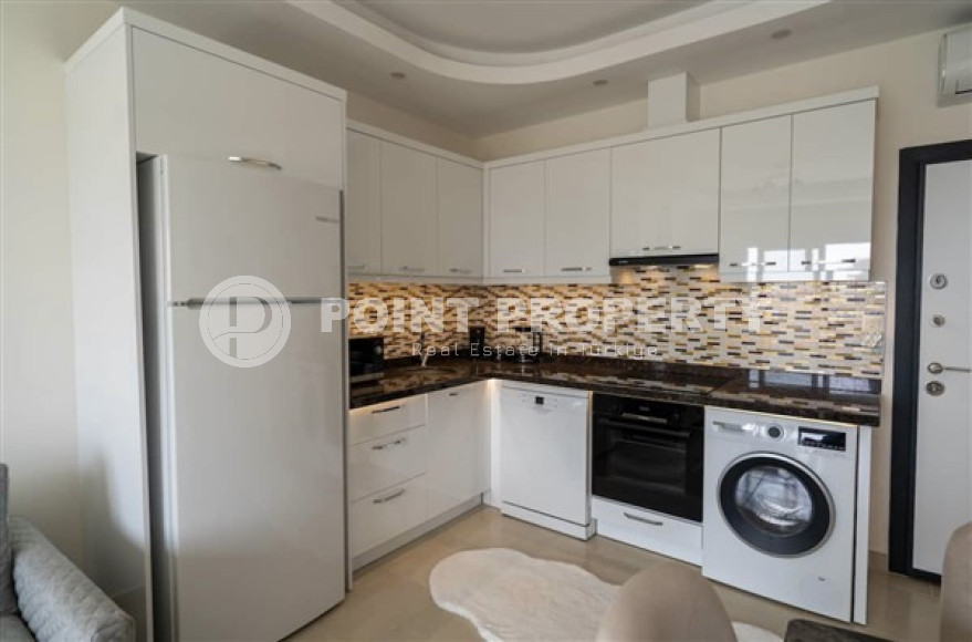 Видовая квартира 1+1, 56м² в элитном комплексе, в 400м от моря в Махмутларе, Алания-id-1557-фото-10