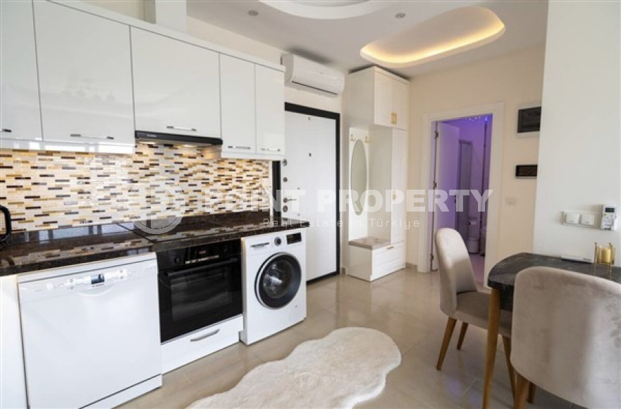 Видовая квартира 1+1, 56м² в элитном комплексе, в 400м от моря в Махмутларе, Алания-id-1557-фото-12