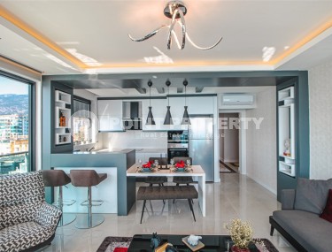 Stylish apartment with designer renovation on the first line from the sea, in the center of the modern area of Alanya - Mahmutlar-id-7149-photo-4