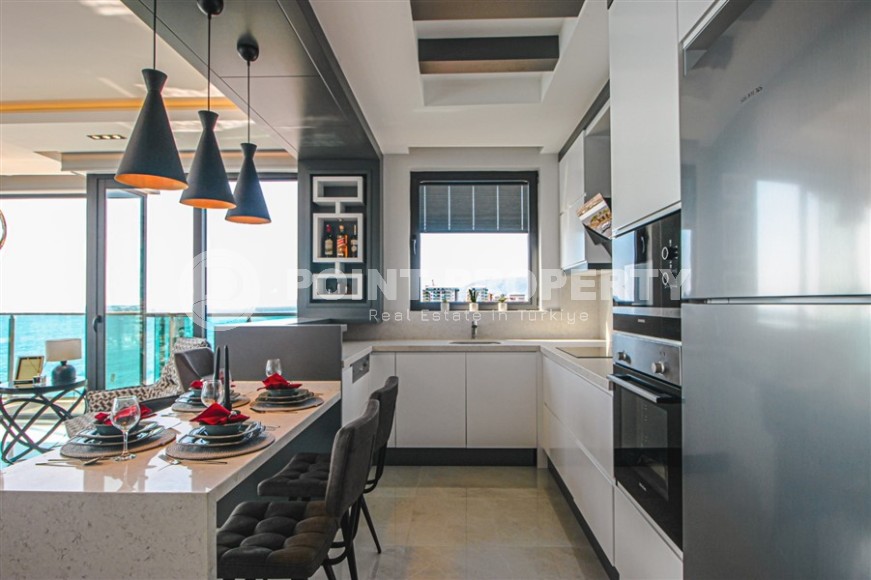 Stylish apartment with designer renovation on the first line from the sea, in the center of the modern area of Alanya - Mahmutlar-id-7149-photo-6