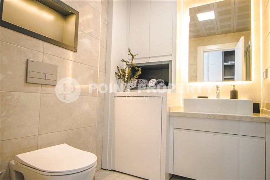 Stylish apartment with designer renovation on the first line from the sea, in the center of the modern area of Alanya - Mahmutlar-id-7149-photo-12