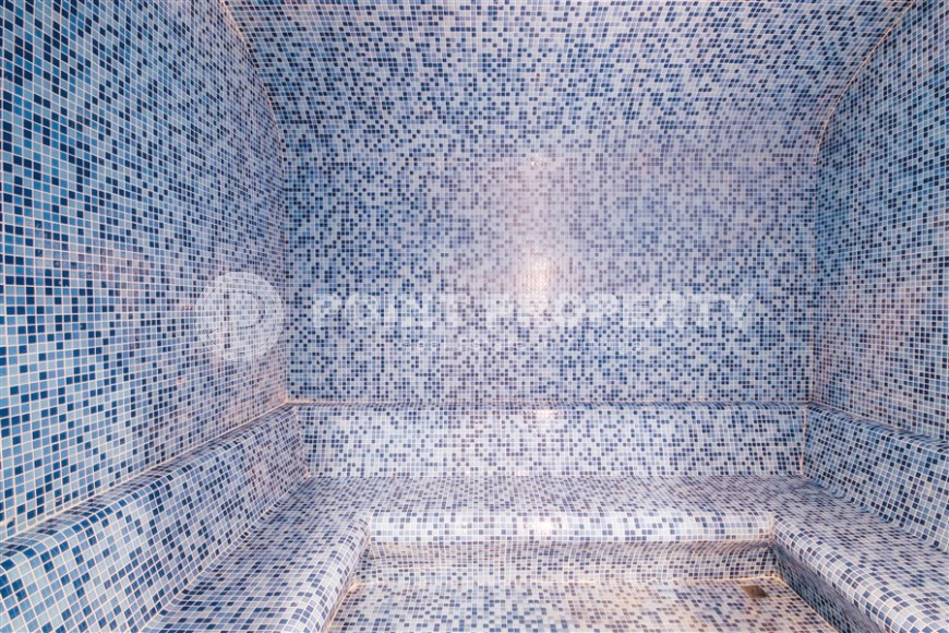 Stylish apartment with designer renovation on the first line from the sea, in the center of the modern area of Alanya - Mahmutlar-id-7149-photo-17