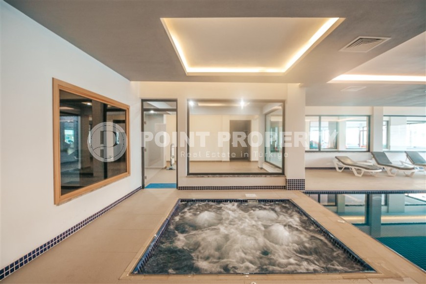 Stylish apartment with designer renovation on the first line from the sea, in the center of the modern area of Alanya - Mahmutlar-id-7149-photo-18