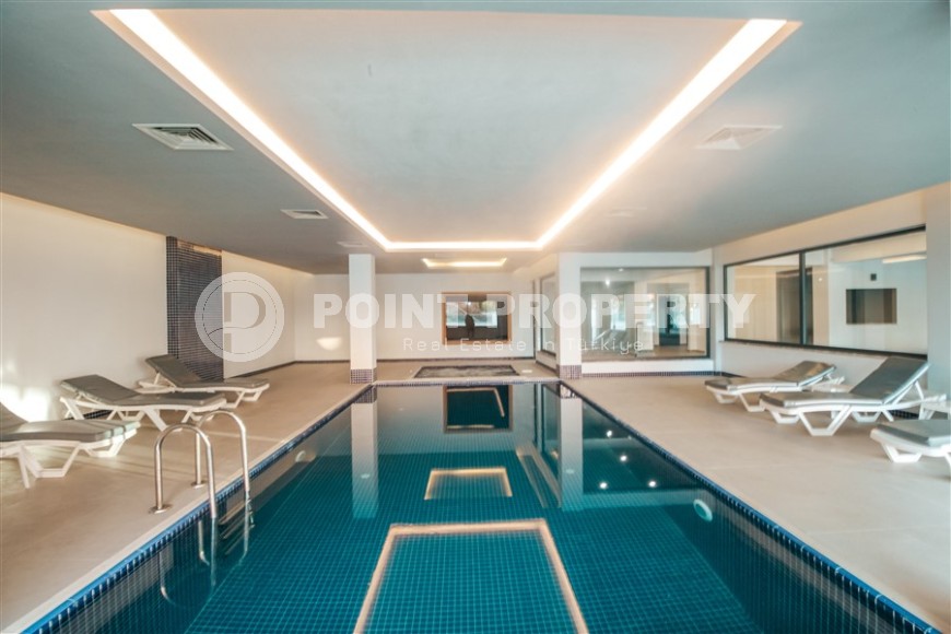 Stylish apartment with designer renovation on the first line from the sea, in the center of the modern area of Alanya - Mahmutlar-id-7149-photo-19