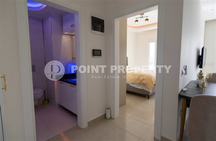 Видовая квартира 1+1, 56м² в элитном комплексе, в 400м от моря в Махмутларе, Алания-id-1557-фото-23