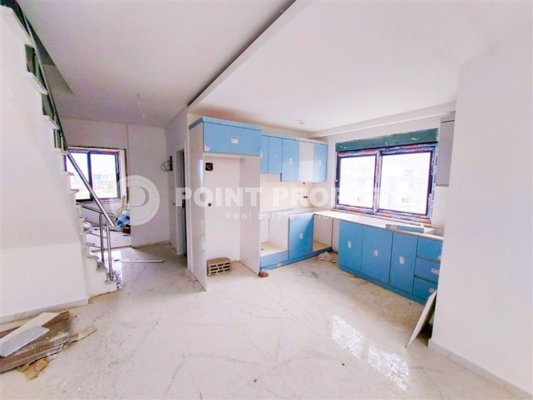 Двухуровневая квартира 2+1 в жилом комплексе на завершающем этапе строительства, в 300 метрах от моря-id-7158-фото-2