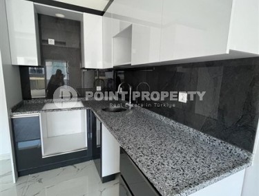 Новая квартира с качественной чистовой отделкой в полутора километрах от моря, в современном районе Аланьи - Верхняя Оба-id-7160-фото-3